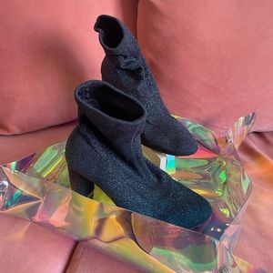 Mandy Glitter Stretch-Knit Black Ankle Boot by Michael Kors.